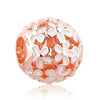 A round rose gold charm pendant featuring a textured finish and white cherry blossom floral design.