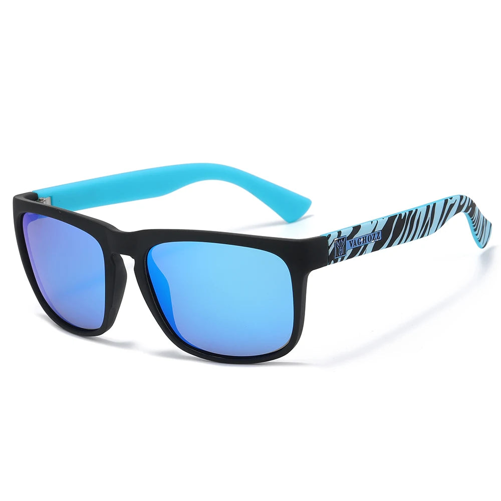 Lunettes noires à verres bleus et bras bleu clair souple, avec motif rayures tigrées noir et blanc.