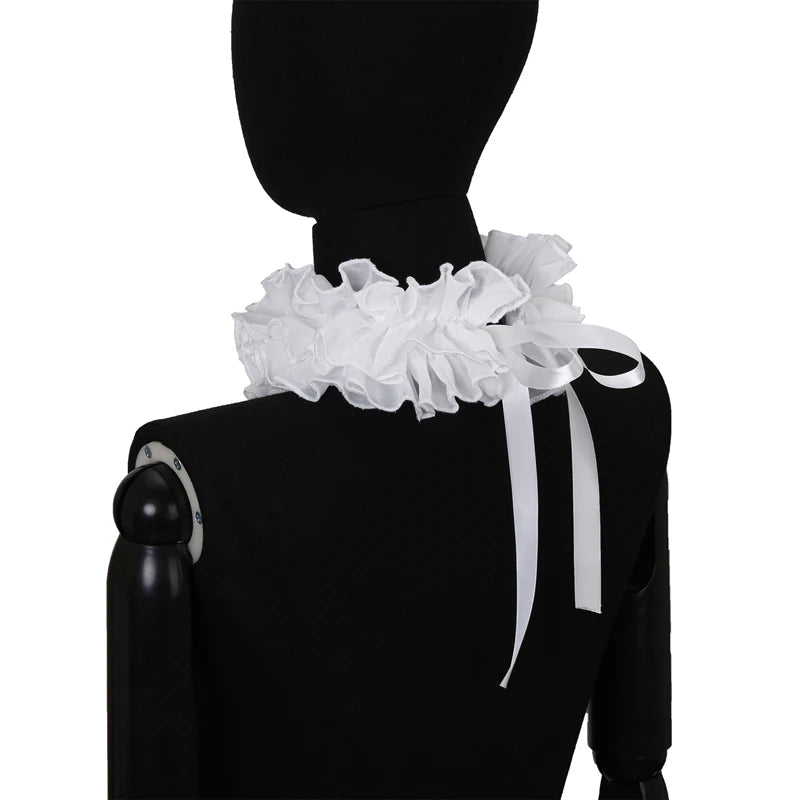 Black mannequin displaying a white decorative pleated ruffle stand collar sweater.