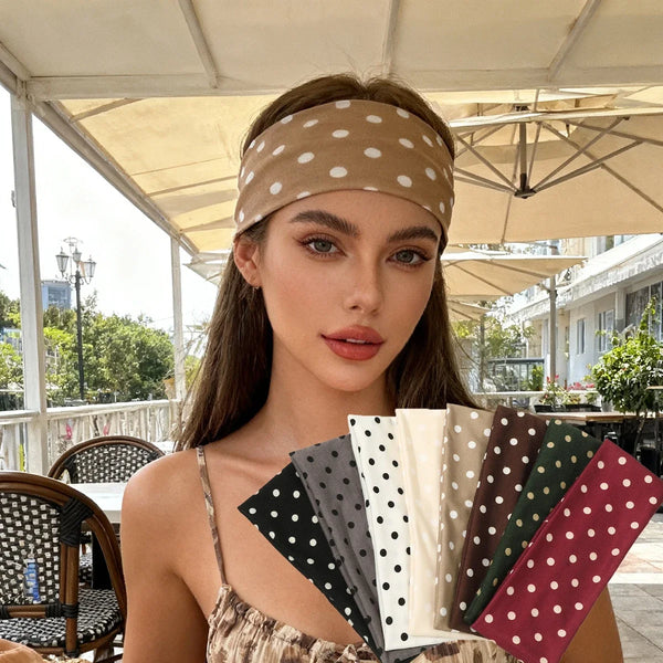 A close-up of a model wearing Y2K retro boho wind dot stretch hairbands in various neutral tones.