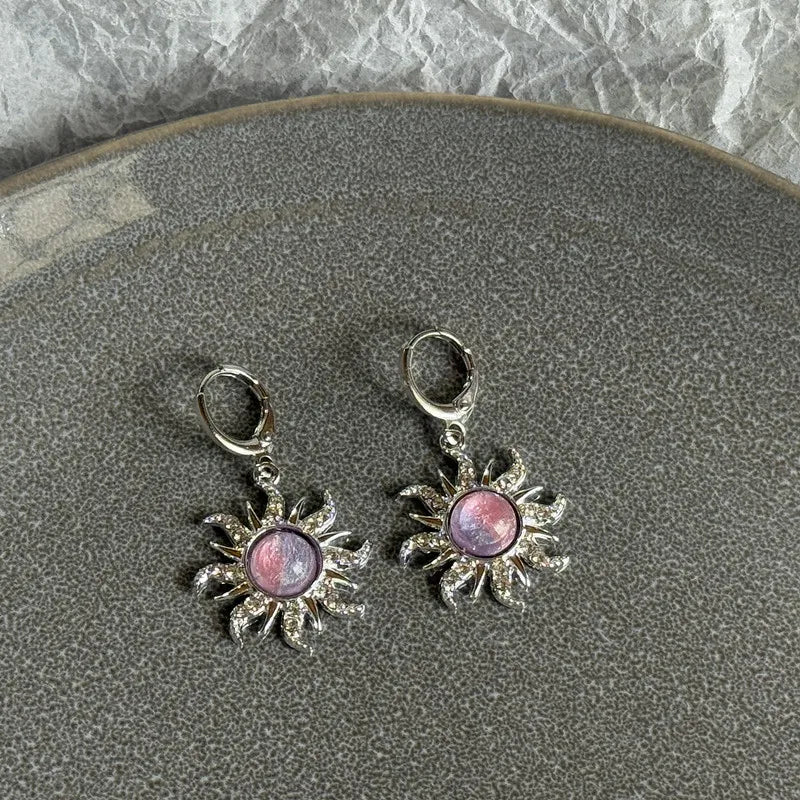 Pair of Y2K sun moon stainless steel hoop earrings with purple and silver accents