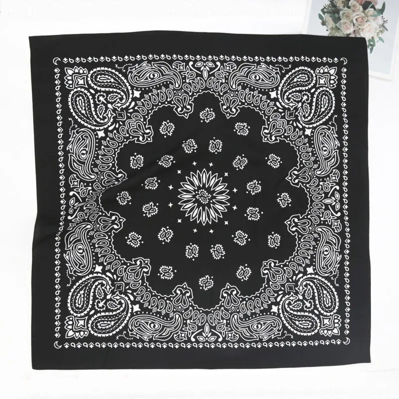 Black and white paisley bandana scarf featuring intricate floral and decorative patterns