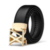 Black leather belt with a gold metal X buckle rolled up and displayed on a white background.
