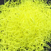 A pile of bright yellow disposable hair scrunchies for ponytail holders.