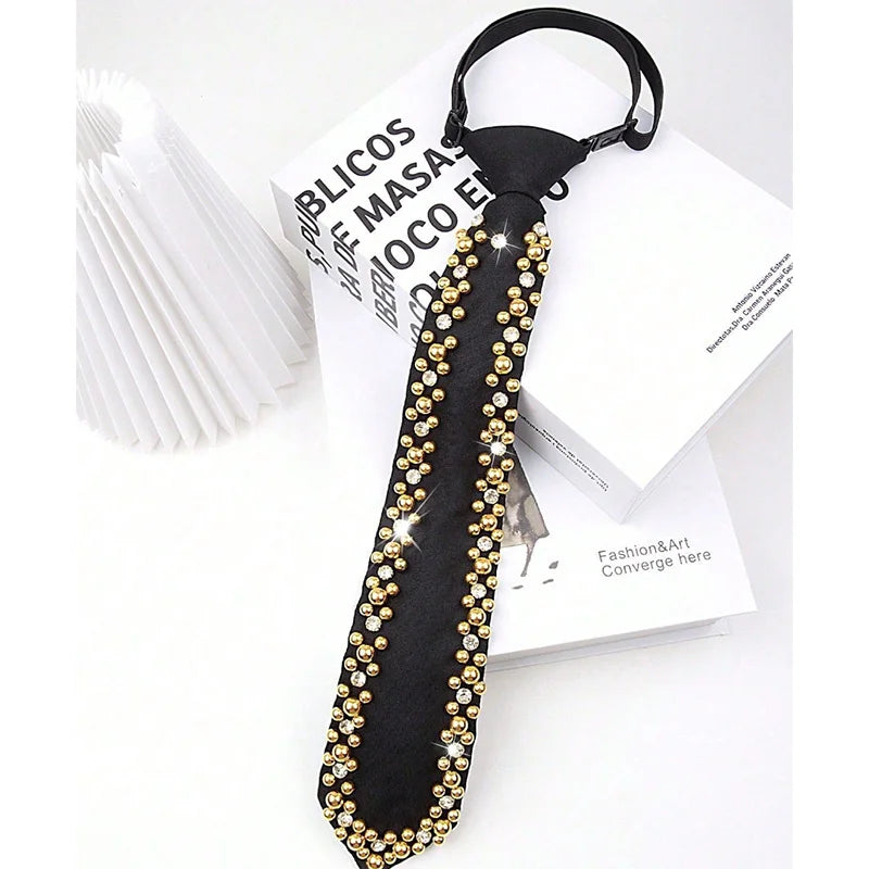 Black neck tie adorned with gold and clear rhinestones and pearls