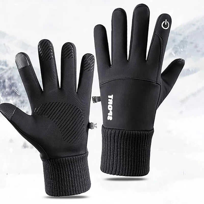 A pair of black winter gloves with a thumb grip and a toggle switch visible against a white background.