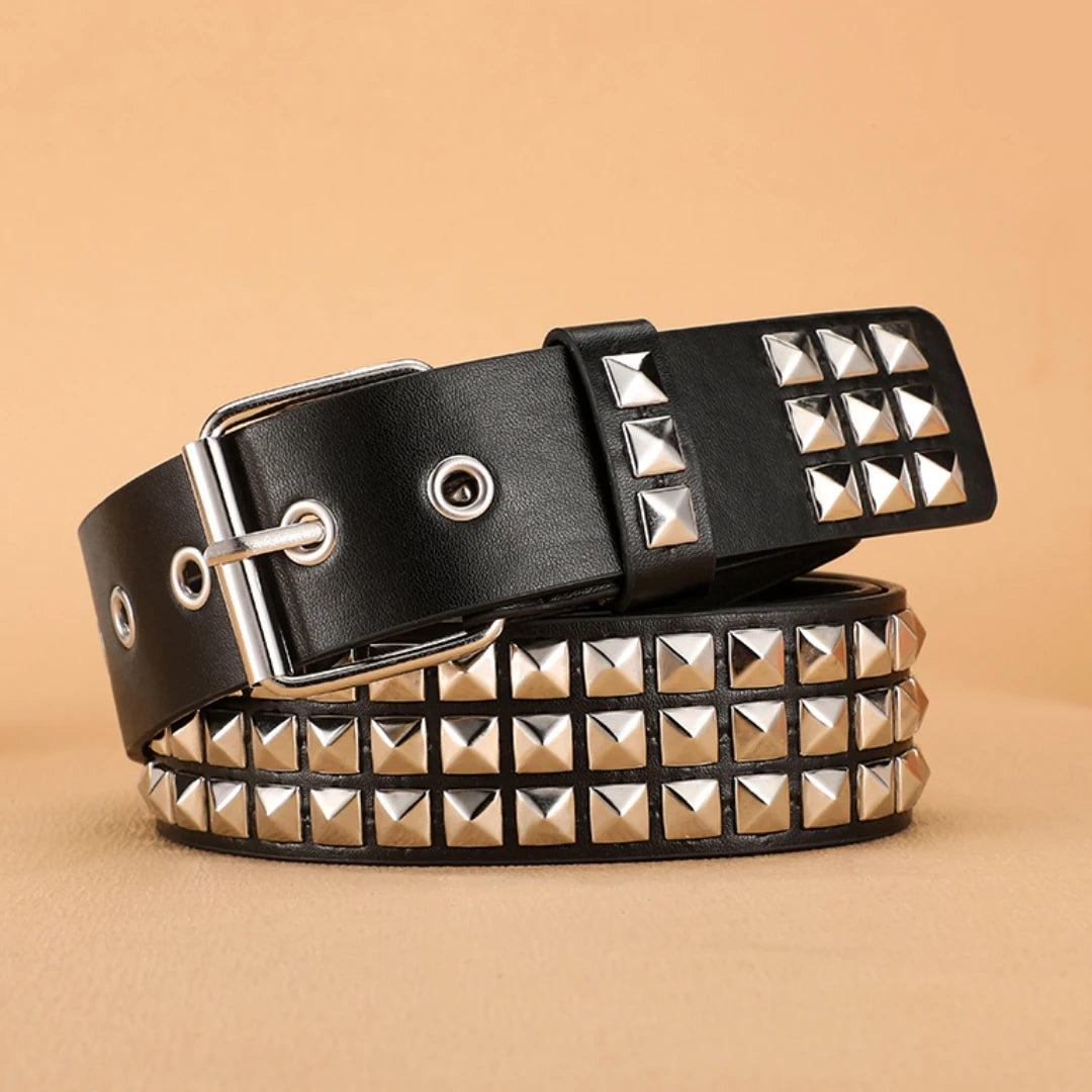 Black leather belt featuring silver metal rivets on the buckle and strap.
