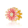 Colgante de flor dorada y rosa con piedra central transparente