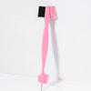 A pink precision edge control hair combing set with black bristles and teeth.