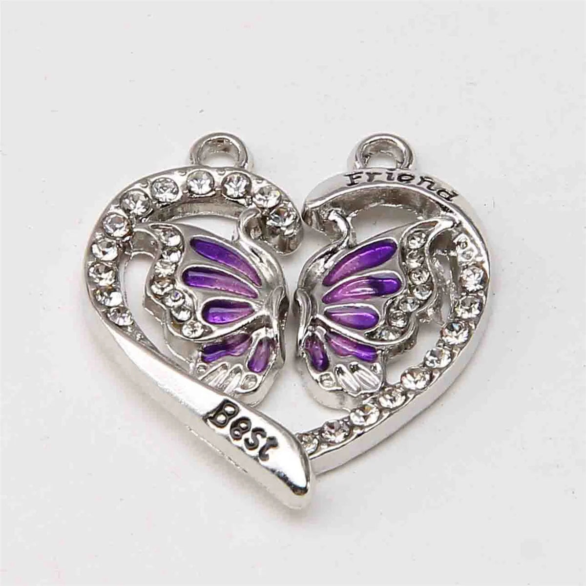 Juego de collares de amistad plateados con colgantes en forma de mariposas y la palabra 'best'