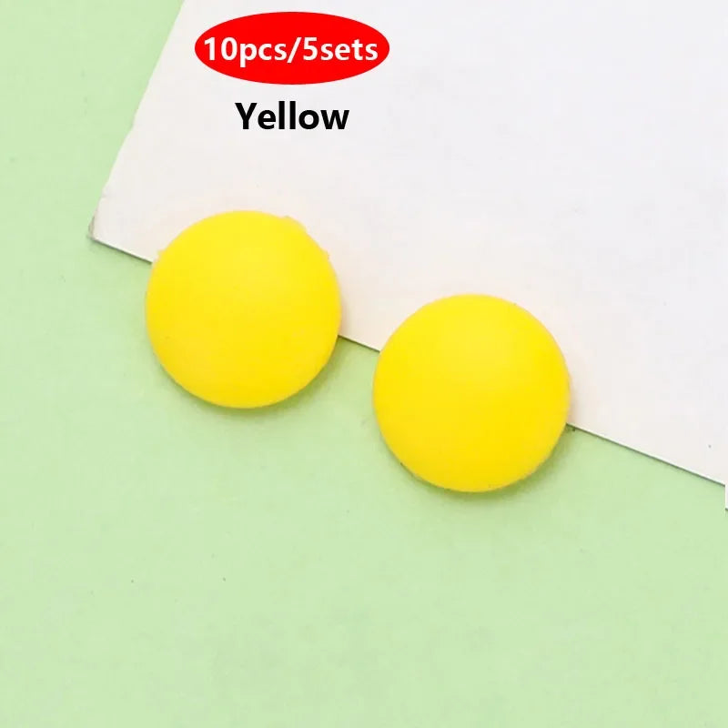 Ten yellow silicone eyeglass grips packaged in five sets