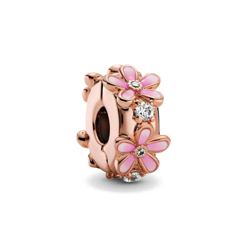 Rose gold charm pendant featuring a pink cherry blossom flower design with clear stones.