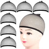 A set of black mesh wig cap liners shown on a mannequin head.