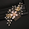 Golden leaf shaped pearl flower hairpin comb with delicate gold and ivory floral accents