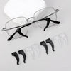 A set of black silicone anti-slip ear hooks for eyeglasses is displayed on a white background.