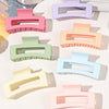 A set of seven square hair claw clips in various pastel colors, including pink, purple, mint green, and peach.