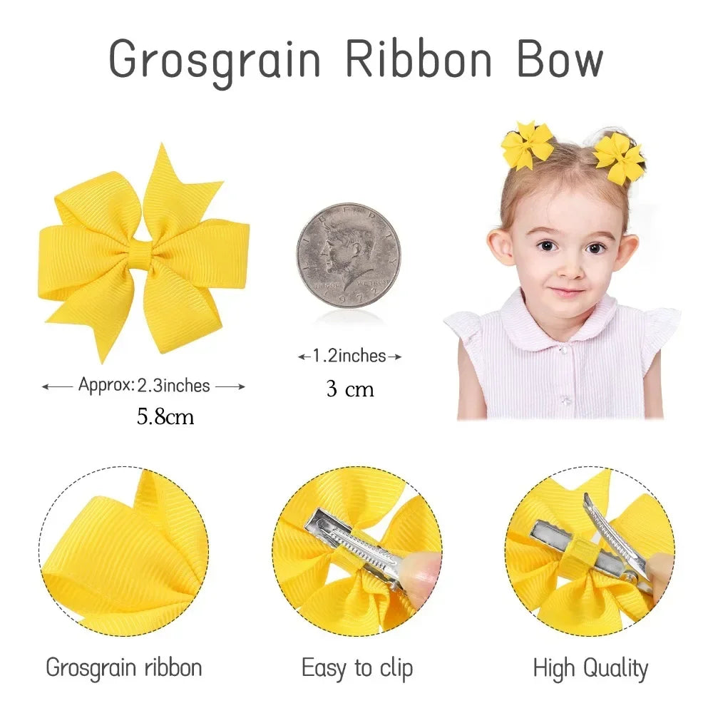 Yellow grosgrain ribbon hair bow with clip and ribbon shown next to a child's face