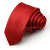 A folded red satin neck tie for formal wear.