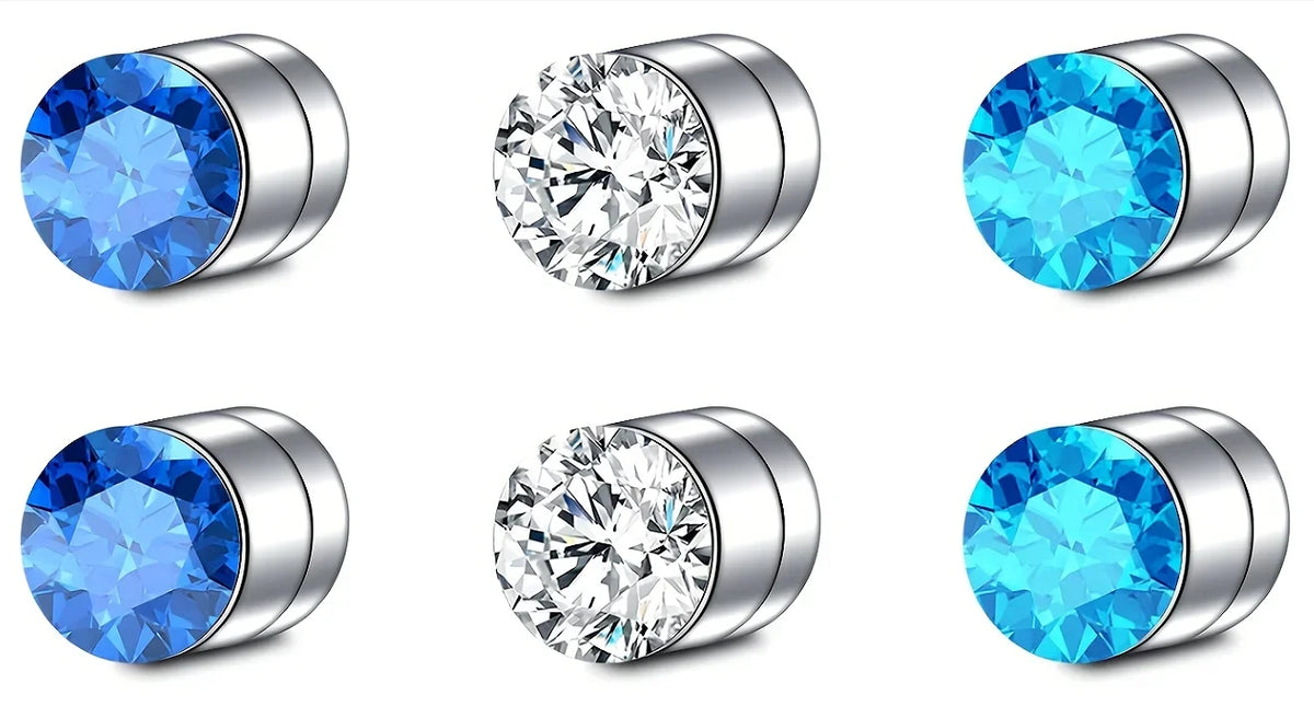 Three pairs of magnetic nose stud earrings made of stainless steel and cubic zirconia stones in blue and clear tones.