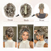 A woman shows off a voluminous curly messy bun hairstyle using a hair accessory.