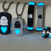A set of six luminous fairy couple jewelry pieces including pendants and bracelets.
