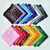 A collection of colorful cotton bandanas and scarves in various patterns and colors arranged on a white background.
