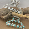 Silver metal hair claw clips decorated with turquoise beads and wire detailing