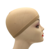 A beige stretch mesh wig net cap is shown on a mannequin head.