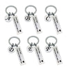 Six personalized initial drive safe keychains in black and silver metal.