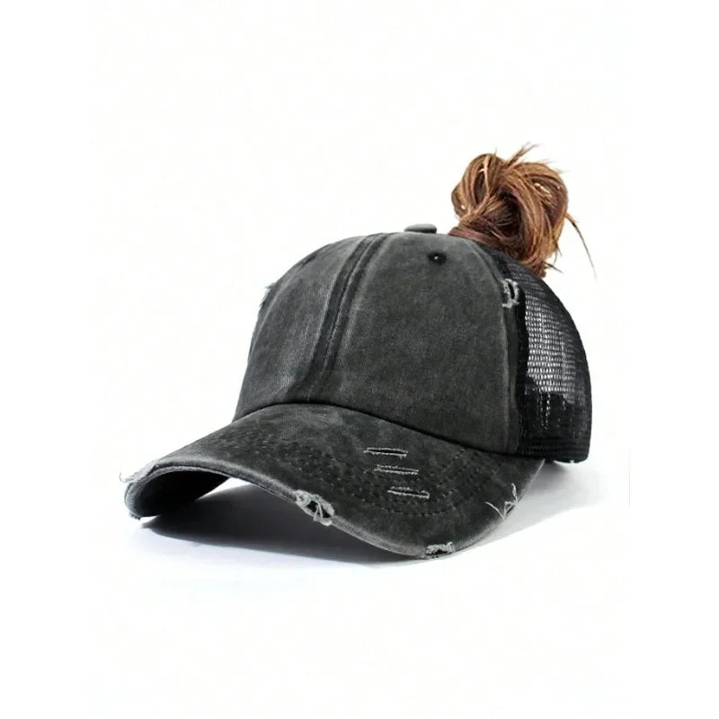 A dark gray vintage mesh baseball cap is shown against a white background.