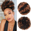 A woman shows off a kinky drawstring ponytail extension hairstyle.