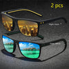 A pair of vintage check pattern sunglasses shown with a night vision lens and a green mirror lens.