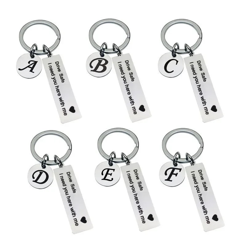 Set of six personalized initial drive safe keychains labeled A through F