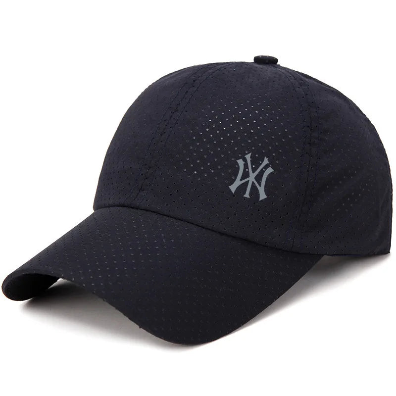 A dark navy blue adjustable baseball cap with a white embroidered interlocking 'NY' logo on the front.