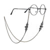 A pair of black-rimmed eyeglasses with a lanyard and chain attached.