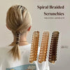 Spiral braided scrunchies in various shades of brown and beige shown being worn in a ponytail