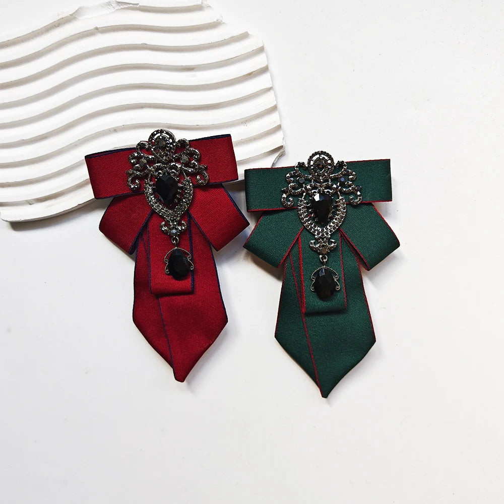 Elegant handcrafted solid color tie with diamond embellishments in deep red and emerald green.