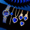 A set of elegant ladies quartz wristwatches featuring blue stones and gold accents displayed against a dark background.