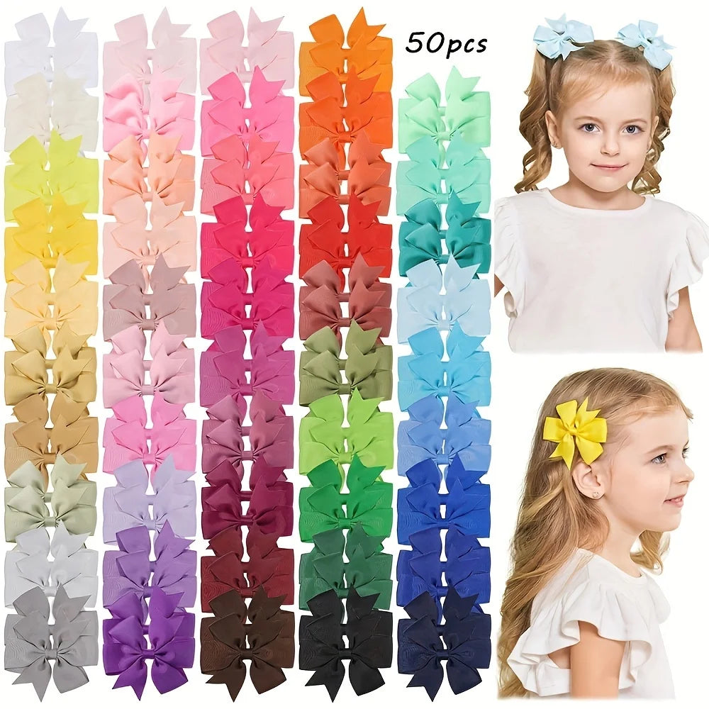 Assorted grosgrain ribbon hair bow clips in various colors for girls