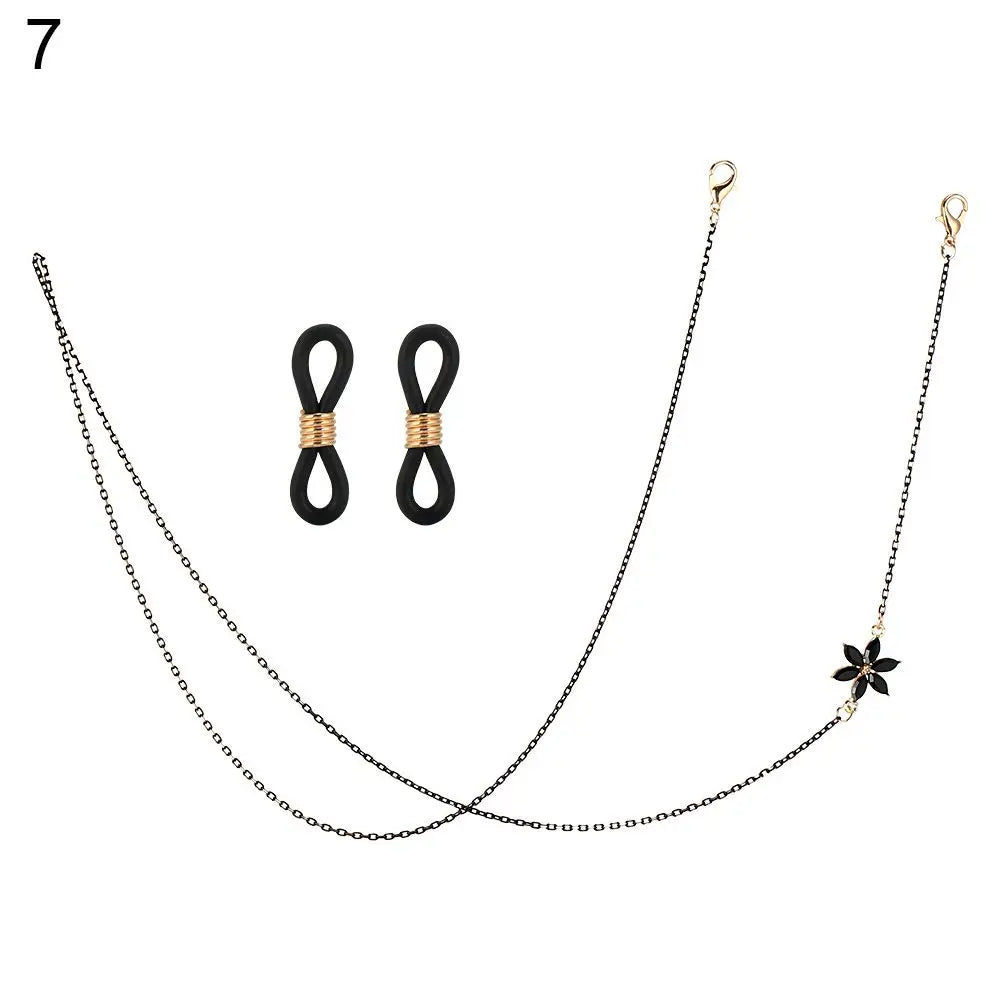 A black lanyard with a hollow star charm and a chain is displayed against a white background.