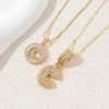 Gold-toned necklace set featuring CZ crystal pendants shaped like the letters A and Z.