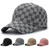 A variety of men's cotton dot pattern baseball caps in black, gray, tan, and pink are displayed.