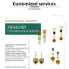 A display of various customized pendant necklaces featuring different gemstone colors and gold plating.