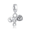 Silver charm featuring a family tree design and an infinity knot, suitable for jewelry.