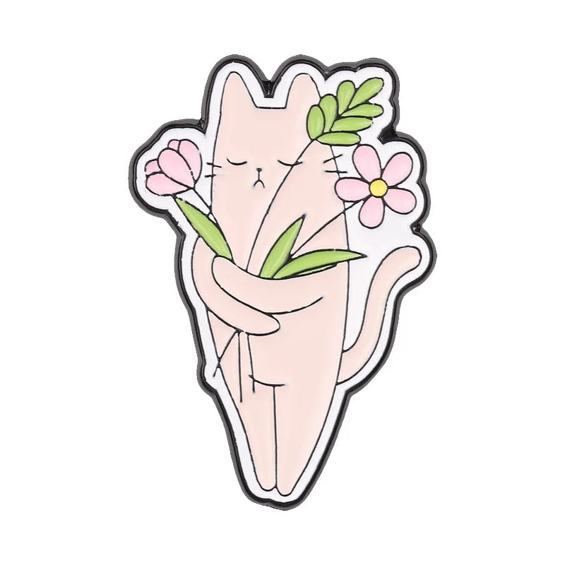 A cute, stylized cat face design featuring pink and green floral elements.
