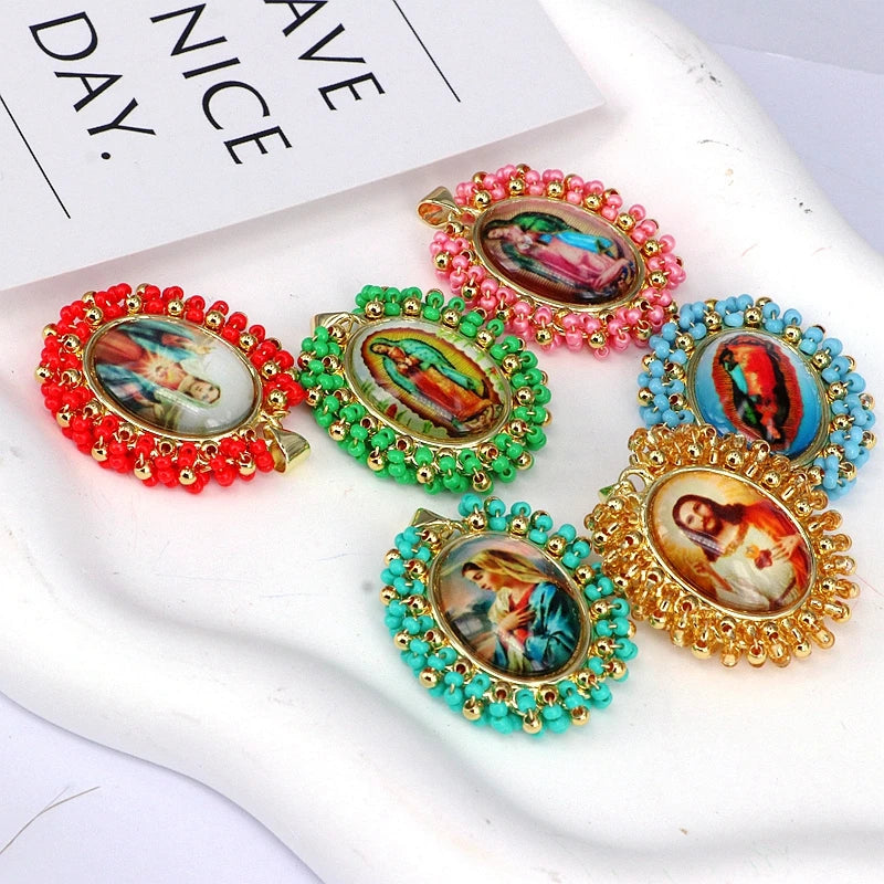 A collection of gold plated copper pendant necklaces featuring colorful Miyuki beads and miniature religious figures.