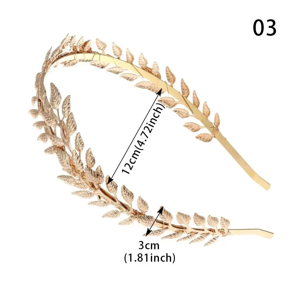 Gold leaf floral headpiece for bridal or party decoration, featuring delicate leaves and a curved design.