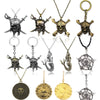 A collection of various skull pendant necklaces in gold and silver tones.