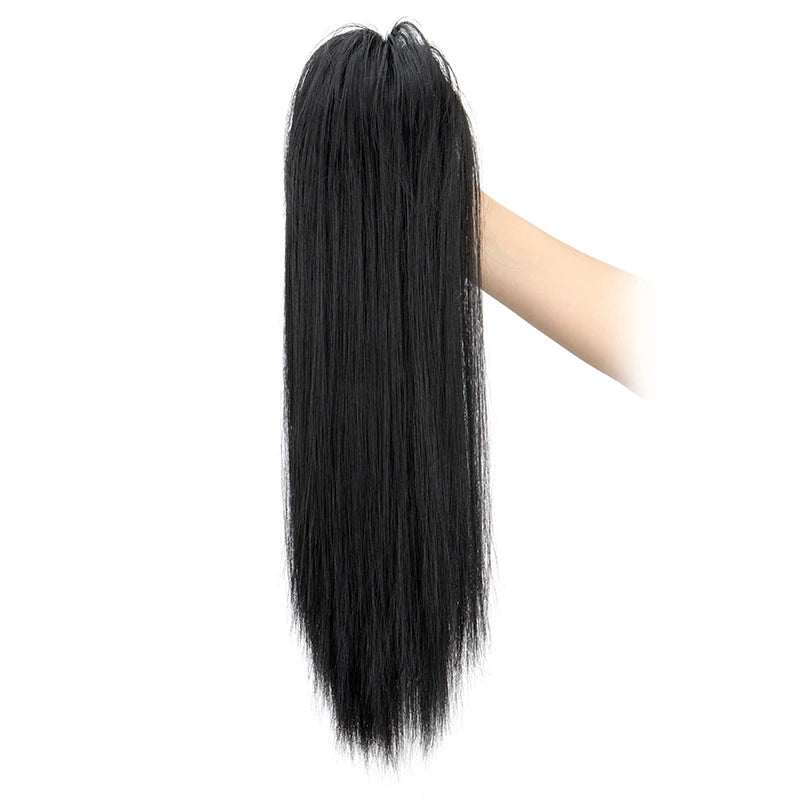 Long, straight black hair extension being held by a hand.
