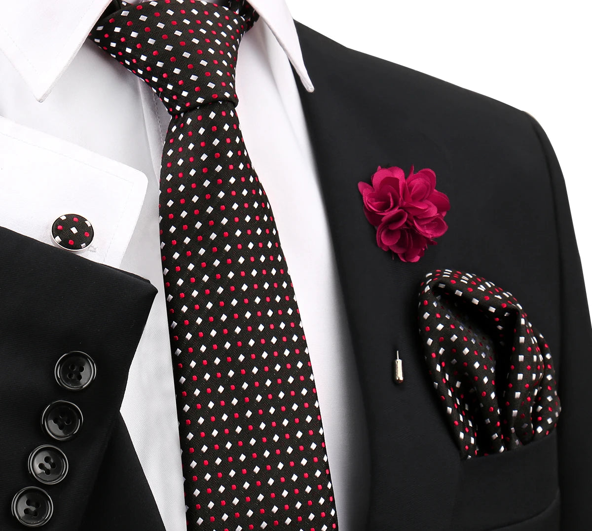 Schwarze und rote gepunktete Krawatte mit weißem Hemd und schwarzem Sakko, mit rosa Blumenanstecknadel.